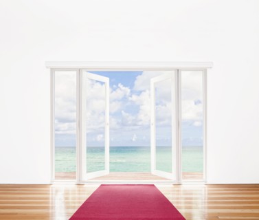 French doors opening onto beach