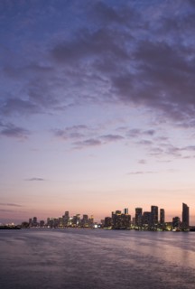 Miami city skyline and harbor at sunset