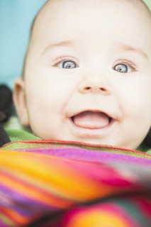 Mixed race baby smiling