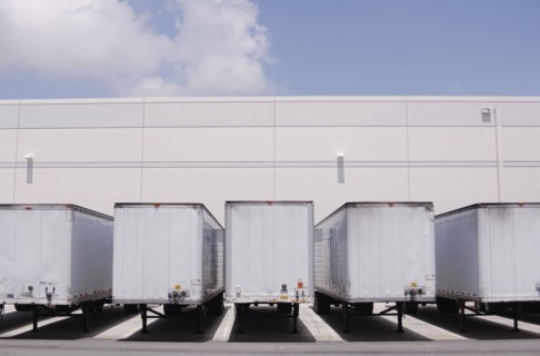 Cargo containers at loading docks