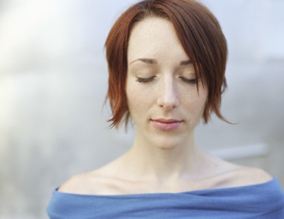 Caucasian woman with eyes closed