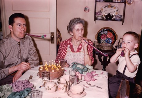 Multi-generation family celebrating birthday