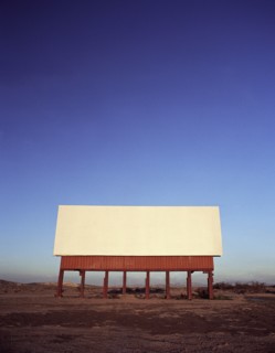 Blank billboard in remote landscape