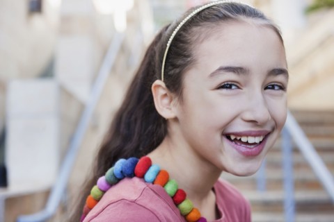 Smiling mixed race girl
