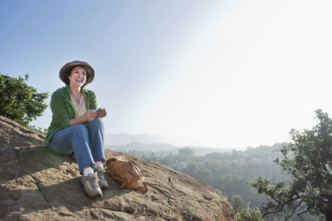 Caucasian woman hiking in remote area
