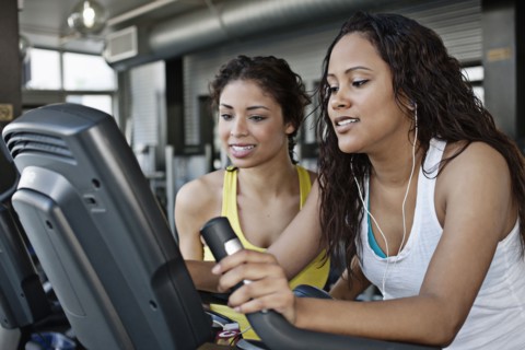 Women exercising in health club