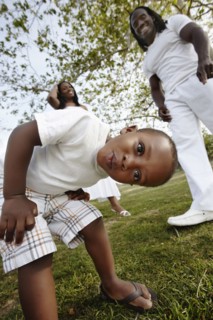 African American family enjoying park