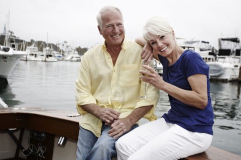Couple drinking wine on boat