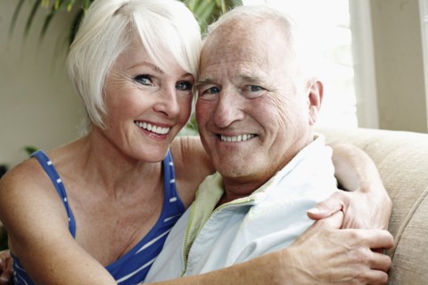 Caucasian couple hugging