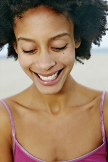 Mixed race woman smiling