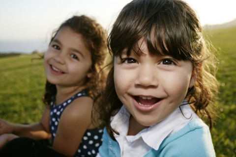 Girls playing in field