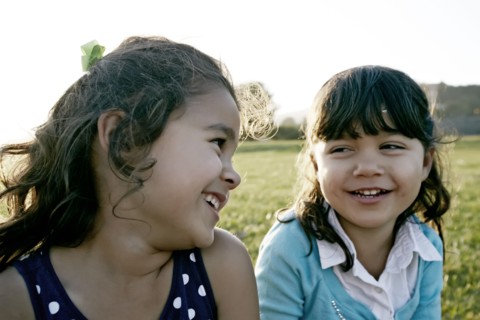 Girls playing in field