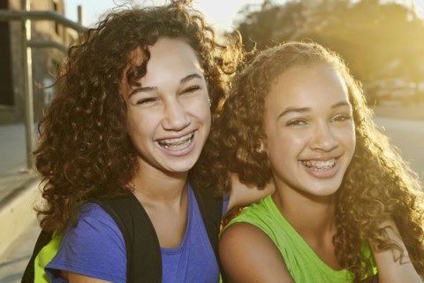 Mixed race girls smiling