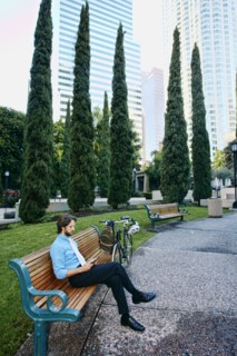 Caucasian businessman relaxing in urban park