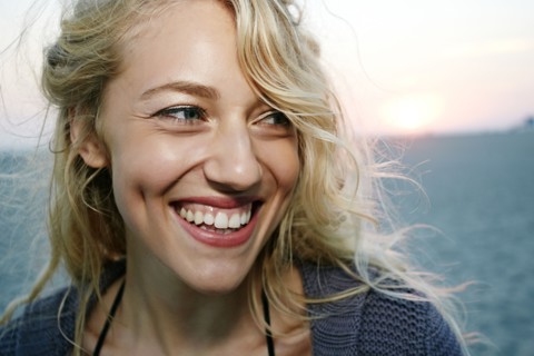 Woman smiling on beach