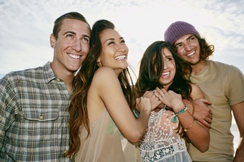 Couples smiling together outdoors