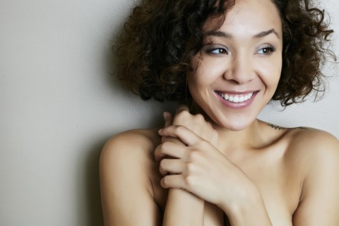 Mixed race woman smiling