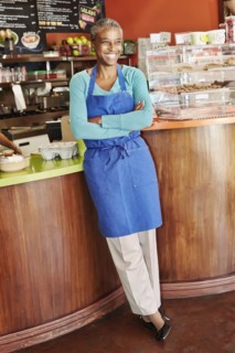 Black server smiling in cafe