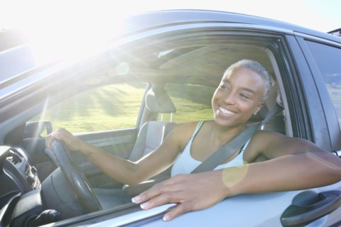 Black woman driving car