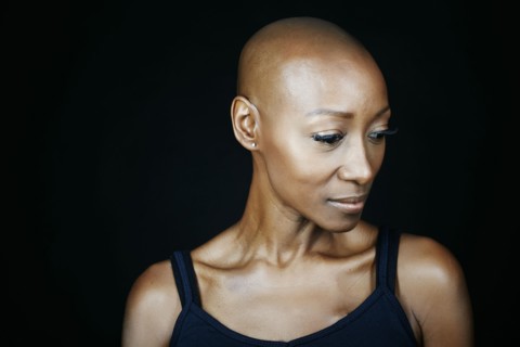 Close up of face African American woman looking down