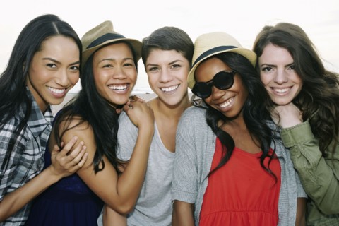 Close up of women smiling outdoors