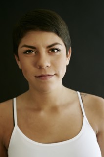 Close up of Hispanic woman with serious expression