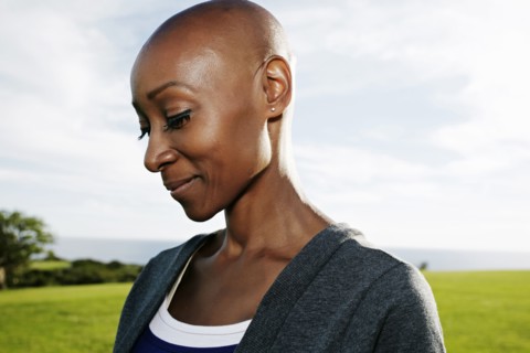 African American woman smiling in park