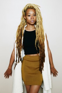 Stylish Black woman with dreadlocks