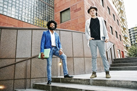 Businessmen standing on steps