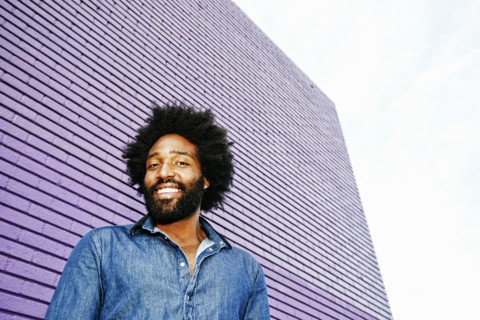 Mixed race man smiling outdoors