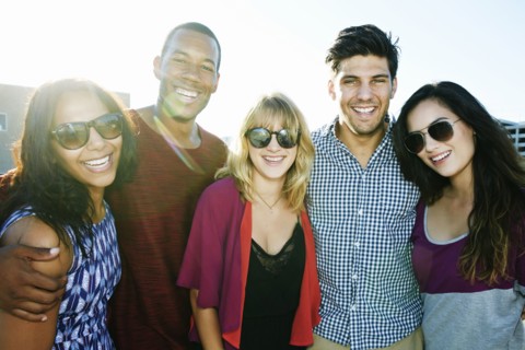 Friends smiling outdoors