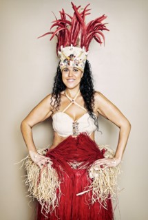 Mixed race hula dancer wearing traditional costume