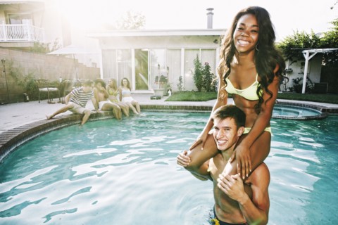 Couple playing in swimming pool