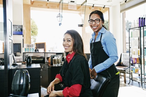 Hairdresser and customer in hair salon