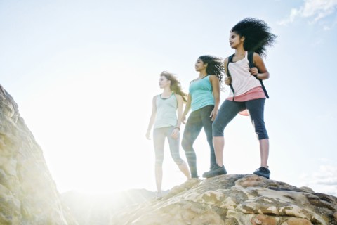 Women standing on rock