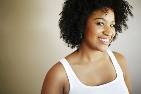 Portrait of smiling Mixed Race woman