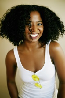 Portrait of laughing Mixed Race woman