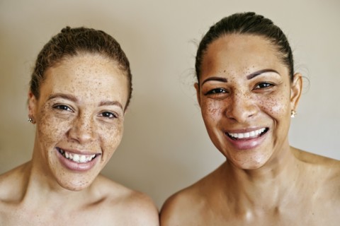 Close up of smiling mixed race women