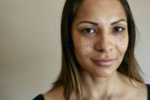 Close up of smiling mixed race woman