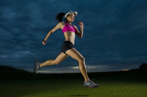 Japanese woman running at night