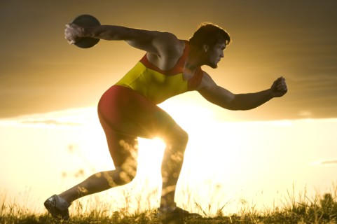 Caucasian athlete preparing to throw discus