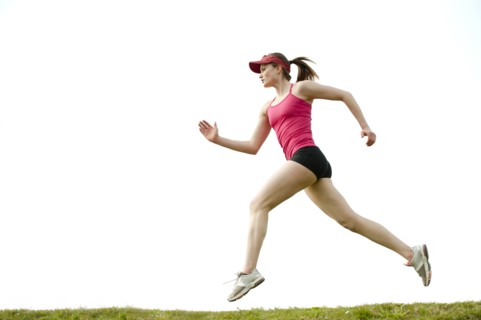 Mixed race teenager running outdoors
