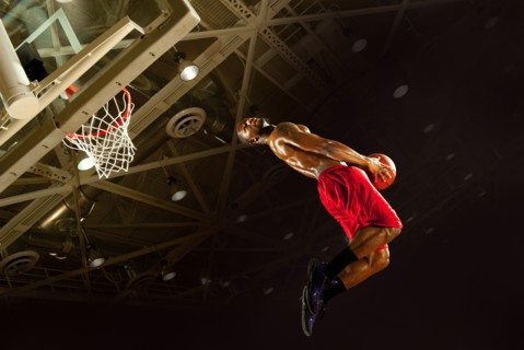 Black man playing basketball