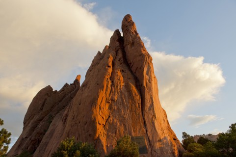 Red cliffs rising in rural landscape