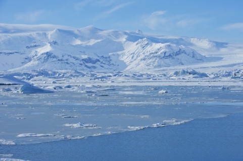 Snowy mountains overlooking arctic landscape