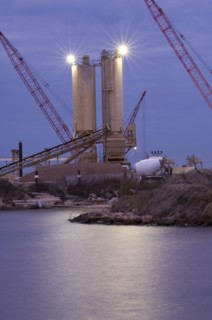Factory overlooking lake