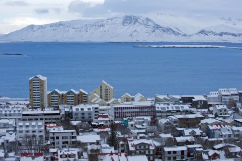 Snowy city and lake in arctic landscape