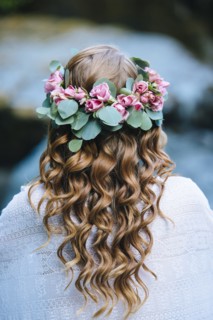 Caucasian woman wearing flower crown