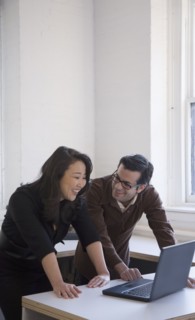 Multi-ethnic businesspeople laughing