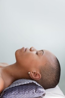 Black woman waiting for spa treatment